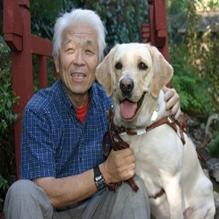 Takashi Tanemori and his dog Yuki